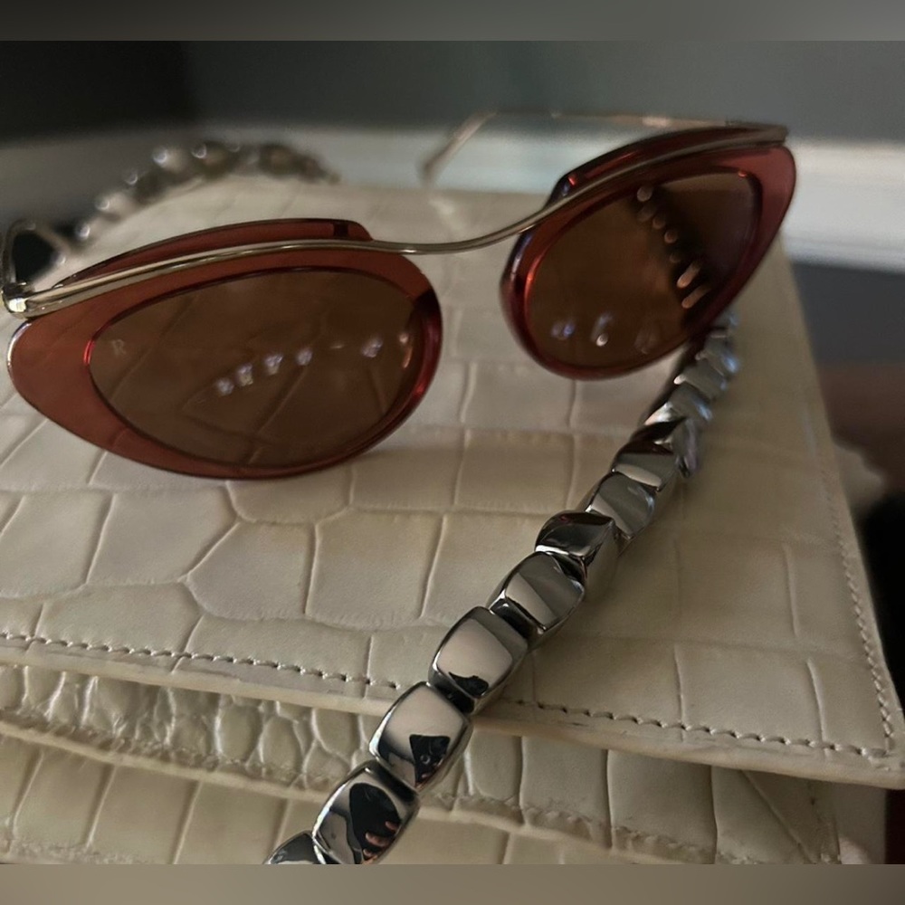 Raen musing sunnies ! In a cinnamon color